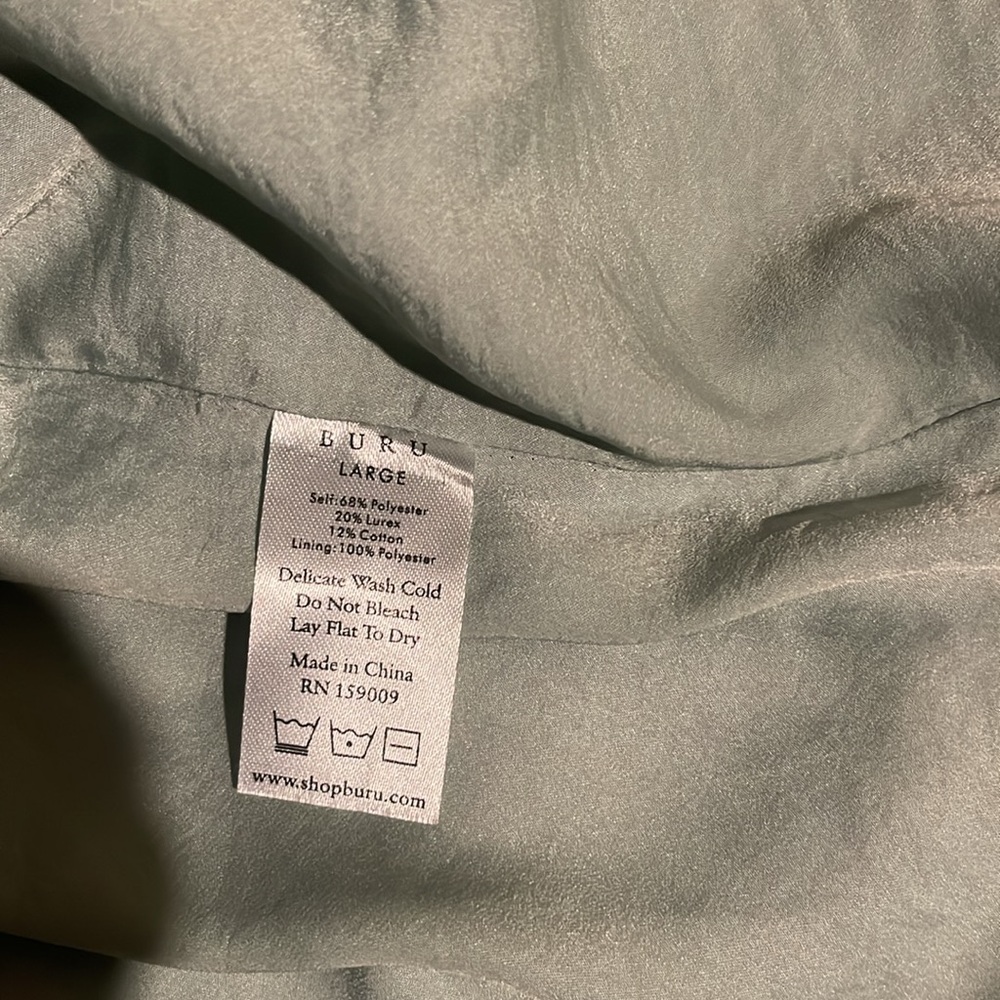 Buru
Party Textured Metallic Pull-On Pocketed A-Line Midi Skirt - Picture 6 of 6